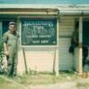 Jim Wellmon at the Base Camp Sign